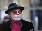 Gary Glitter pleads not guilty to child abuse offences