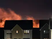 Huge field fire in Fife near homes as firefighters remain at scene