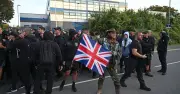 Hundreds protest after Danny Tommo charged over dinghy slash