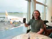 Inside the airport pub where 9am pints are perfectly normal