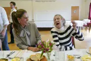Kate joins 60th anniversary lunch group, asks for crisps