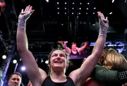 Katie Taylor retires as world champion after Flora Pili victory