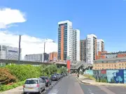 Man dies in Poplar tower block fire, child and adults rescued