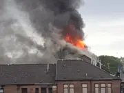 Man in court over Glasgow tenement fire amid asylum rumours