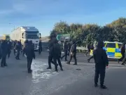 Masked protesters block Port of Dover, causing major travel disruption