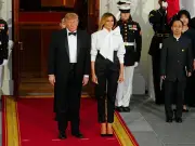 Melania Trump 'beaming' at state dinner, body language expert claims
