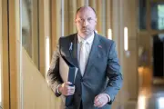 Minister urges Glasgow sides to resolve fire and rehire dispute