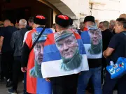 Mladic lies in state as thousands honour 'Butcher of Bosnia'