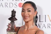 Nicole Scherzinger performs with large burn after boiling water accident