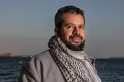 Palestinian adviser sues NSW over keffiyeh ban at Sydney school