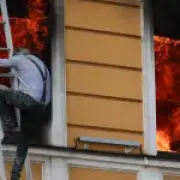 People flee burning Kyiv building after Russian drone strike