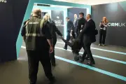 Police seek protester after hair-pulling footage at Reform conference