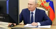 Putin appears confused while voting in Russia's 'fixed' election