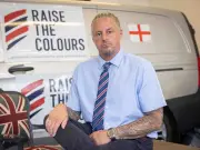 Raise the Colours founder charged with 14 offences after Farage praise