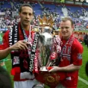 Rooney disagrees with Ferdinand over Man City medal stance