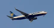 Ryanair cuts passenger target and warns of higher fares