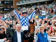 Saffie Osborne makes history as first female jockey to win British Classic