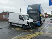 Three in hospital after bus and van crash in Rock Ferry