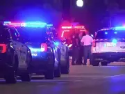 Toddler among seven injured in Baltimore shooting as police hunt 'cowards'
