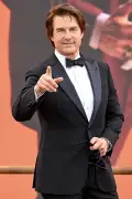 Tom Cruise debuts striking red hair at London Digger premiere