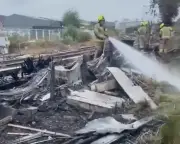 Trackside fire near Clapham Junction disrupts Victoria trains until 2pm