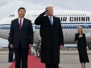 Trump aide Natalie Harp accused of editing herself into president's photo