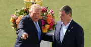 Trump booed and heckled at Presidents Cup as speech cut short