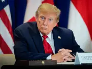 Trump tells female reporter to be 'quiet' in clash over press pool