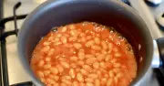 Two cupboard staples make cheap baked beans tastier