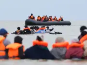 UK-France migrant deal could pave way for EU agreement, experts say