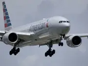 Woman arrested after stripping naked on American Airlines flight