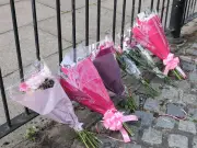 Woman killed in Woolton crash named locally as tributes left
