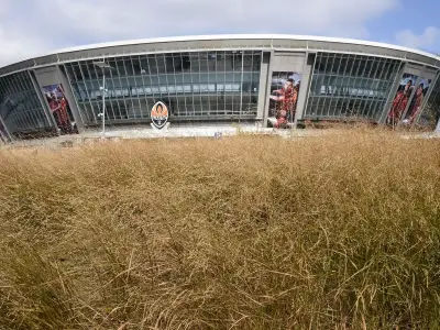 Abandoned Champions League stadium in Ukraine now overgrown with explosives warnings
