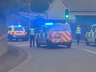 Armed police called to Fife street over men with gun report