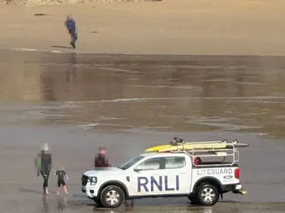Dad punches beachgoer after taking kids into stormy sea in Cornwall
