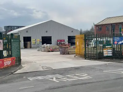 Luxury car dealer plans Bolton showroom at former Travis Perkins site