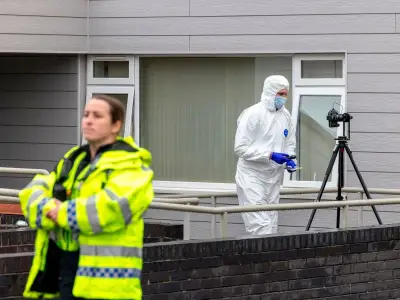 Man, 61, arrested after woman dies in Bridgend murder probe