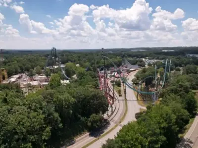 Man dies after plunging from 200ft rollercoaster with son beside him