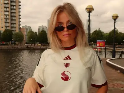 Man Utd Fan Therese Gudmundsen Poses in Bodo/Glimt Shirt