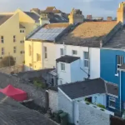 Manhunt after dying man found dumped in wheelie bin in Plymouth alley