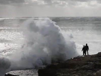 Met Office cuts wind warning as seven UK regions face 70mph gusts