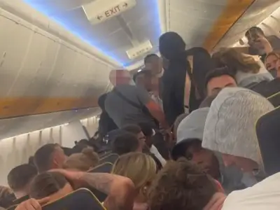 Mid-air brawl erupts on Ryanair flight to Ibiza as police race to meet plane