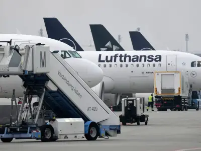 Passenger arrested after trying to open plane door mid-air on Lufthansa flight