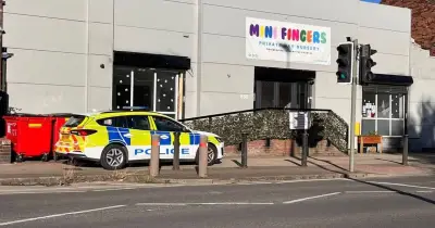 Police at Salford nursery as tactical aid vans arrive