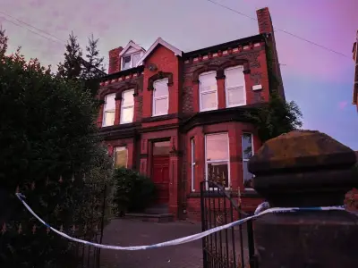 Police remove substances after man found dead in Wirral house