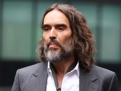 Russell Brand arrives at court for third day of rape and sexual assault trial