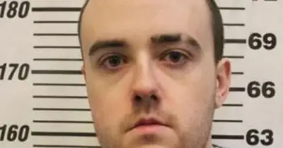 Tennessee manhunt for murderer who escaped prison through fence
