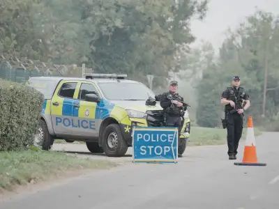 Two men charged under National Security Act after RAF Fairford probe