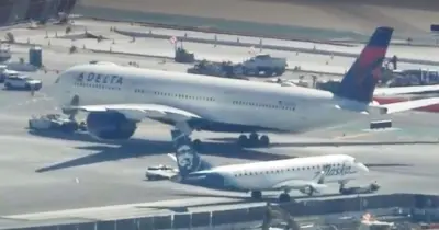 Two planes collide at major airport in terrifying smash