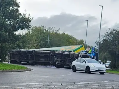 Warrington road closed after lorry overturns on roundabout